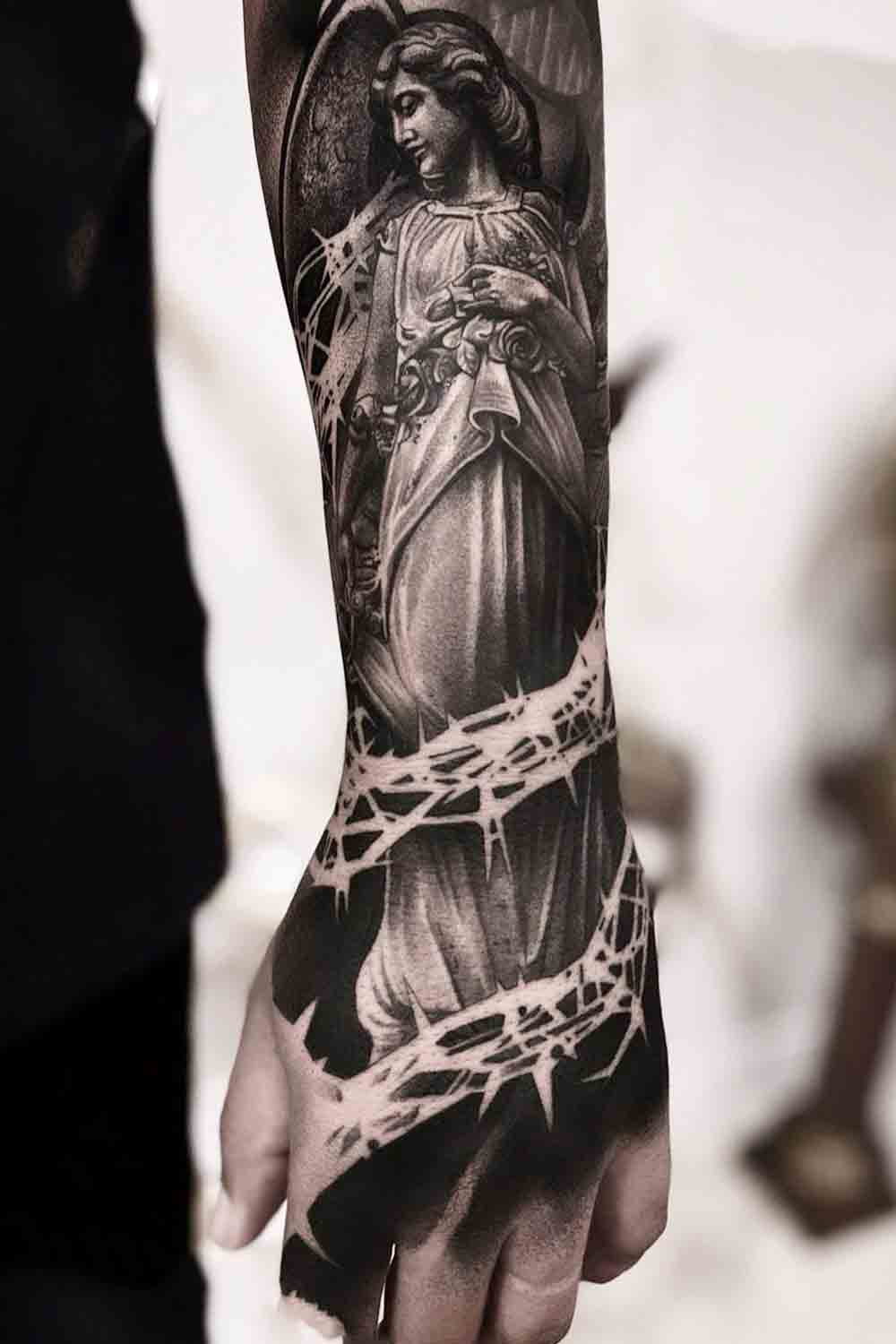 tatuagem-religiosa-no-antebraco 