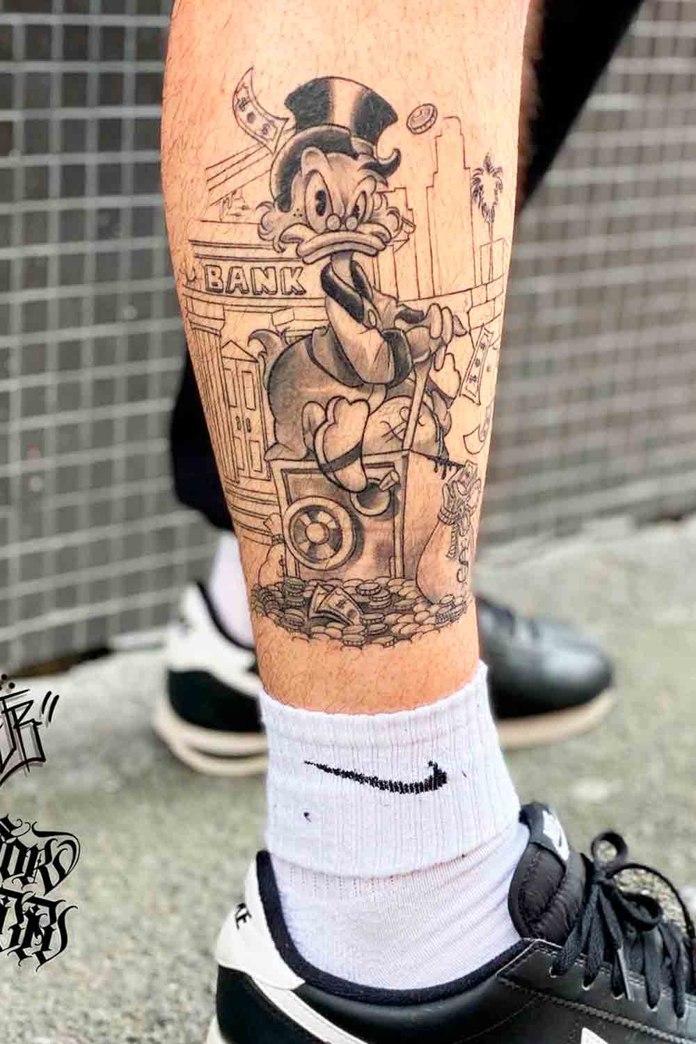 tatuagem-do-tio-patinhas-na-perna-1 