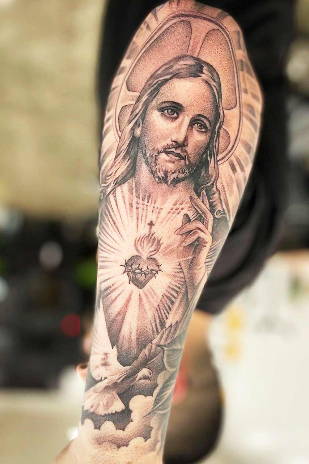 tatuagem-realista-de-jesus-no-antebraco 