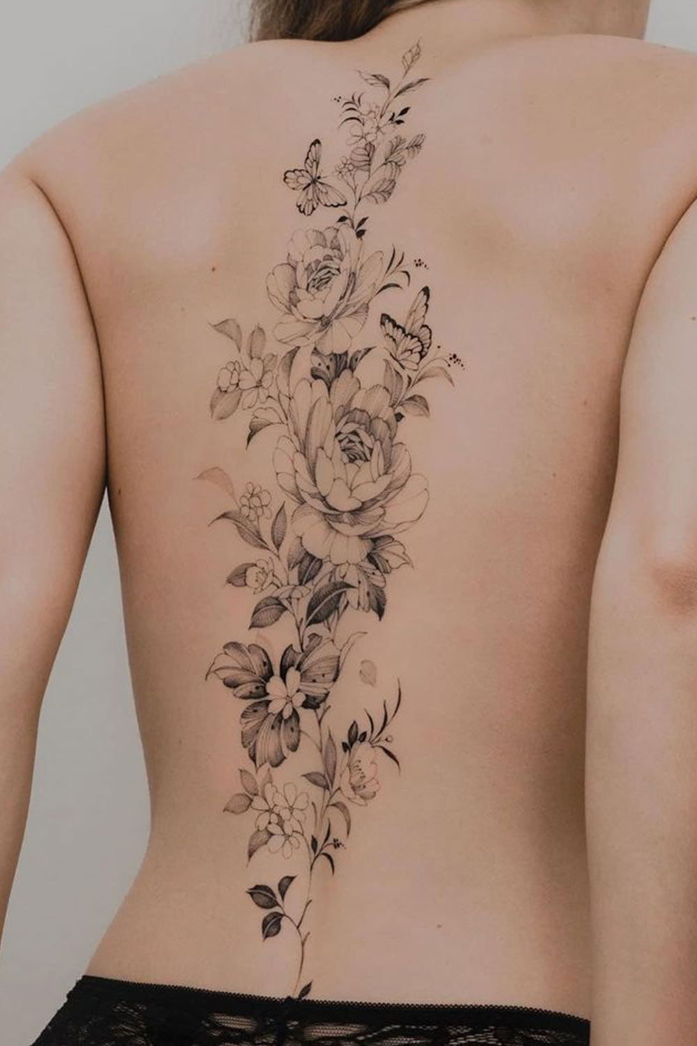 1-tatuagens-florais-nas-costas-@tritoan_7th 