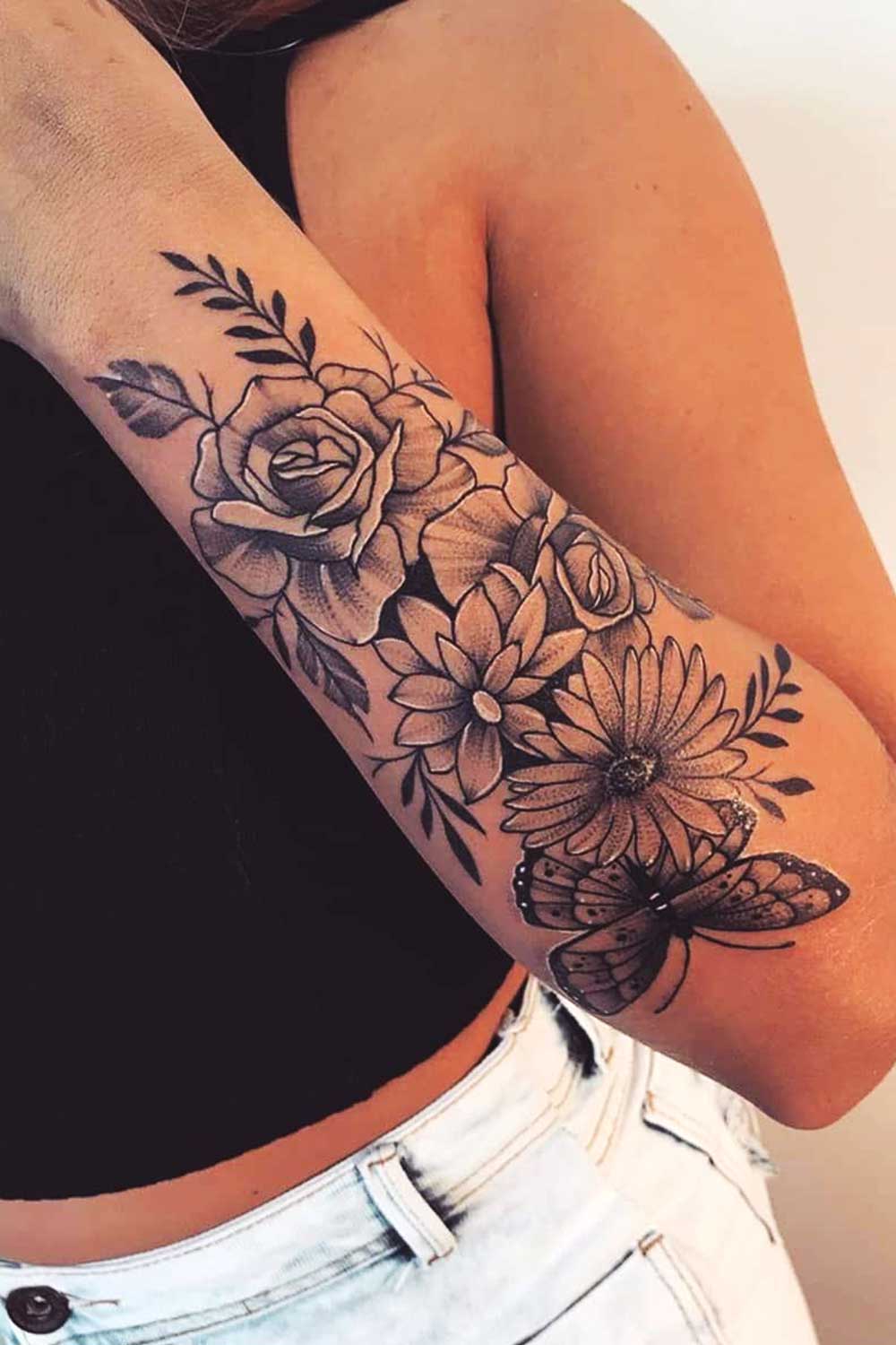 tatuagem-floral-no-anterbaco-feminino 
