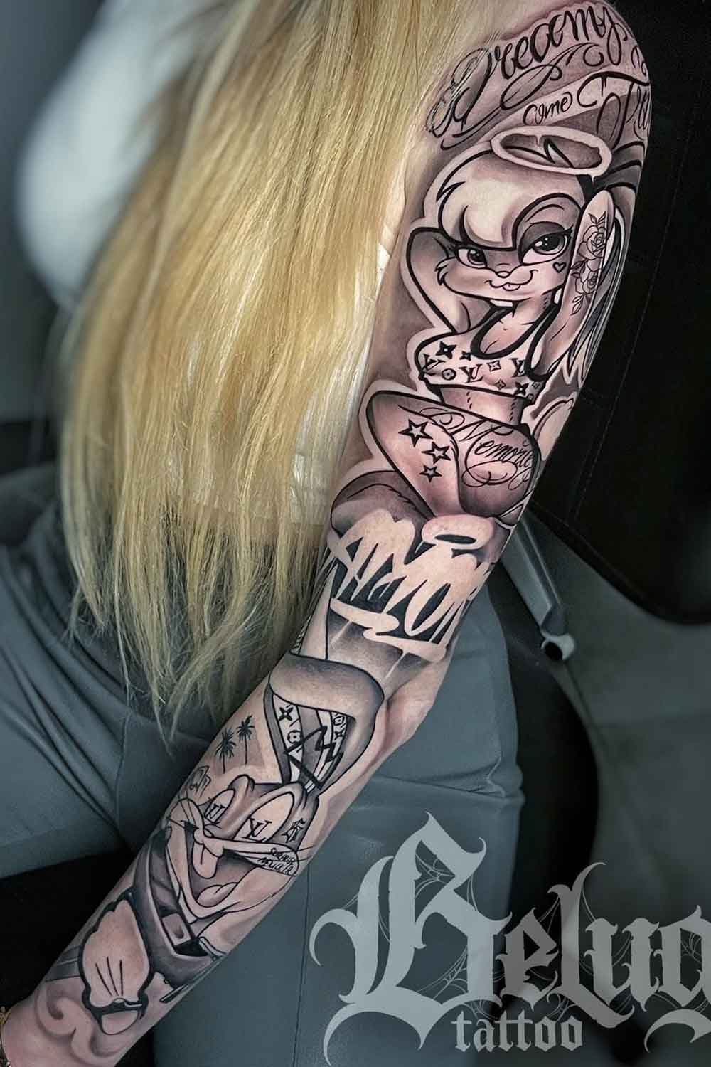 braco-feminino-fechado-de-tatuagens-3 